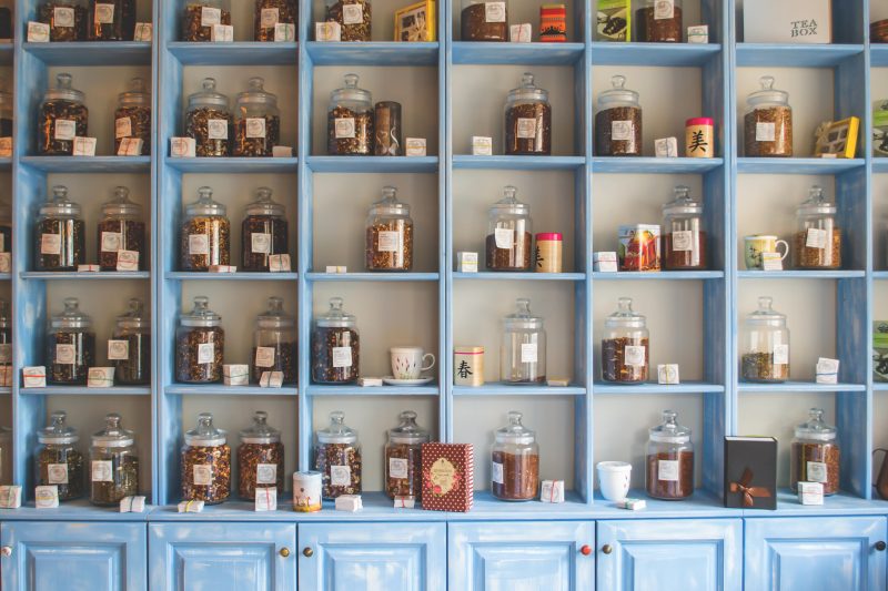 blue wooden cabinets with lollies